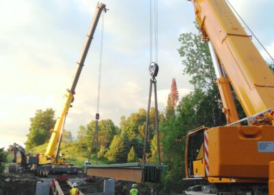 Two Cranes Set 110,000 lb. 84' Next Beam in Craftsbury, VT