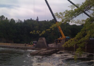 Rolling out a new membrane-Winooski Dam, VT