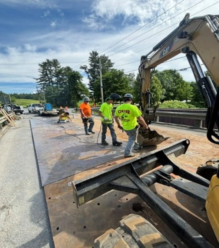 Crew of CCS working on the Stowe's North Hollow Bridge Repair